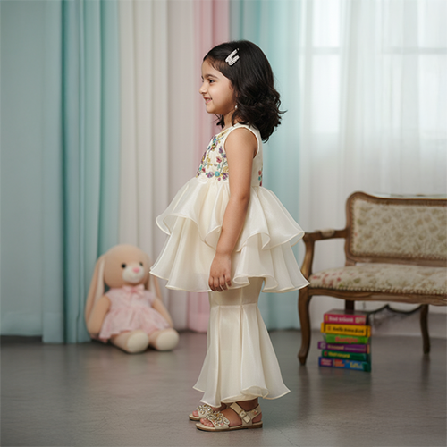 Off White Peplum Style Embroidered Kurti With Fish Cut Palazzo