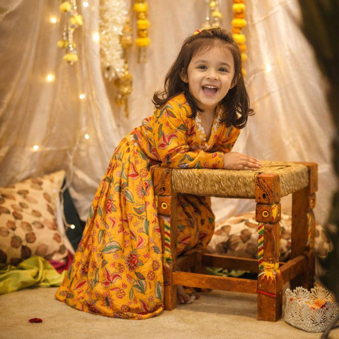 Yellow Printed Top Lehenga With Stylish Knot At Back