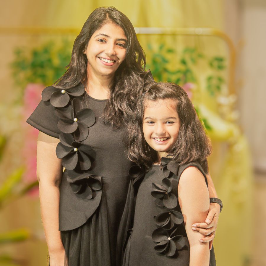 BLACK DRESS WITH 3D FLOWER EMBELLISHED IN FRONT