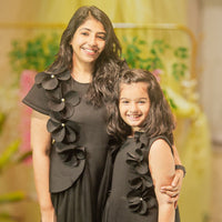 BLACK DRESS WITH 3D FLOWER EMBELLISHED IN FRONT
