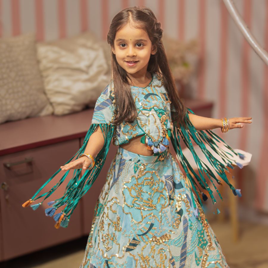 BLUE EMBELLISHED FABRIC  TOP LEHENGA WITH TASSELS